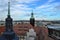 Chemnitz city view from ancient clock tower during overcast weather.