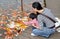 Chengdu, China: Mother and Daughter Feeding Fish