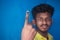 Chennai, India - 5th March 2021: Indian Voter Showing His Hand with voting sign and ink pointing vote for India