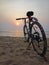 Chennai, India - April 15th 2022: Hybrid Road Cycle Parked on the beach. Hybrid 7 Speed Gear Cycle