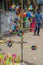 CHENNAI, INDIA - August 23, 2019: vendor selling colorful plastic windmill on Indian temple festival