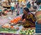 CHENNAI, INDIA - FEBRUARY 10: An unidentified the woman sells vegetables on February 10, 2013 in Chennai, India. Fresh vegetables