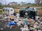 Chennai, India - January 2nd 2021 : Injured Street Dog Scavenging Searching Food on the Scraps at Street Garbage Dump