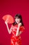 Cheongsam woman show red envelope