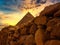 The Chephren pyramid behind a historic stone wall at Giza in Egypt