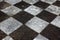 Chequered paving slabs