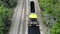 CHERKASSY REGION, UKRAINE - MAY 31, 2018: Aerial view on repair of a highway, the process of laying a new asphalt