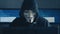 Cherkassy, Ukraine, January 10 2019: Anonymous Hacker in Black Hoodie Hiding his face under mask of Guy Fawkes and