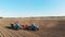 CHERKASSY, UKRAINE, SEPTEMBER 24, 2021: potato harvesting. Farm machinery, tractor with trailer and potato harvester