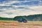 Cherkasy, Ukraine - June 15, 2012: Large and powerful tractor German manufacturer Fendt, standing in a field