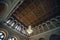 CHERNIVTSI, UKRAINE- January 21, 2021: Chandelier and ceiling. Famous marble hall of Chernivtsi University. Old decorative