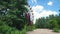 Chernobyl Abandoned Amusement Park Ferris Wheel Across Overgrown Barren greenery