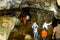 Cherrapunjee, Meghalaya, May 6: Group of tourists visiting Mawsmai Cave. Narrow, rugged limestone cave with dimly-lit access point