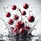 Cherries falling into a water splash