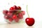 Cherries in glass dish. Cherry on wood and white background. - healthy eating and food concept