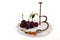 Cherries and pitter on plate