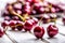 Cherries. Sweet Cherries. Fresh Cherries. Ripe cherries on wooden concrete table - board