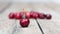 Cherries on a wooden table.