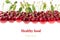 Cherry background. Bunches of ripe juicy rich shiny cherries on a white background.