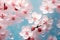 Cherry blossoms and bubbles on dreamy blue background
