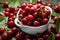 cherry cherries bowl with leaves on wooden desktop table. water drops on Fresh sour cherry