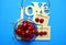 Cherry fresh on a plate love blue background