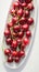 Cherry freshness Plate of sweet cherries with water droplets, tempting