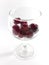 Cherry fruit in a transparent wineglass. Cherry for a snack. Photo 