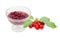 Cherry jam in glass dessert bowl and fresh cherries
