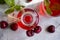 Cherry juice, fresh berry dessert  closeup  cocktail refreshing a light background