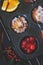 Cherry orange muffins in muffin baking pan; food background