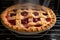 cherry pie baking in the oven, with sweet juices bubbling through its flaky crust