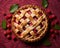 cherry pie with lattice on a red background