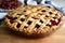 cherry pie with lattice top crust, ready to be served and enjoyed