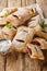 Cherry puff pastry with powdered sugar and mint close-up. Vertical