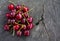 Cherry raspberries on a cracked stump