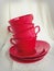 Cherry red vintage stacked tea cup and saucer set