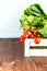 Cherry, tarragon, basil, spices Ingredients for cooking pasta. Food background on a wooden table