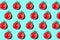 Cherry tomato pattern on light blue background