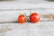 Cherry tomato, small tomatoes on wooden background