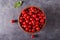 Cherry tomatoes in a clay bowl. Colorful tomatoes Tomatoes background