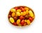 Cherry tomatoes of different colors in the woden basket, yellow, orange, red, green