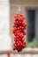 Cherry tomatoes hanging for drying.