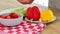 cherry tomatoes.Vegetable plate. Hands cutting red tomatoes. Healthy assorted vegetables