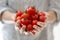 Cherry Tomatoes in Womans Hands