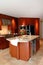 Cherry wooden kitchen doors with island