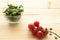 Cherrys tomatoes on wooden background.