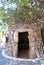 Chersonissos, Cyprus, Greece - 31.07.2013:Hut collected from stones under a green tree in Crete