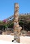 Chersonissos, Cyprus, Greece - 31.07.2013: small figures are carved on a wooden post