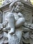 Cherub at base of New York City street lamp